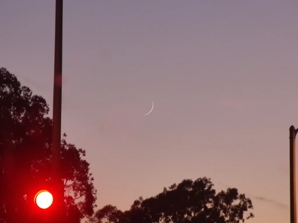 New Moon in the night sky